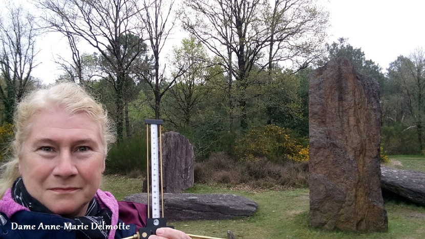 Anne-Marie Delmotte with her Lecher antennaat the standing stones of Monteneuf in Brittany