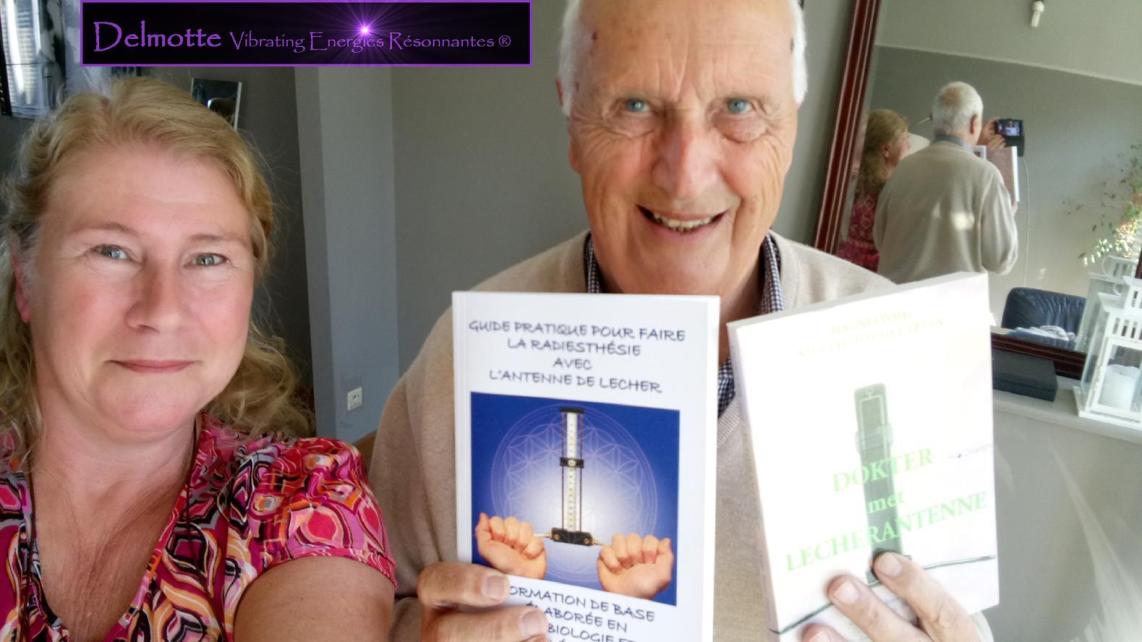 Anne-Marie Delmotte and Dr. Driscart exchanging books